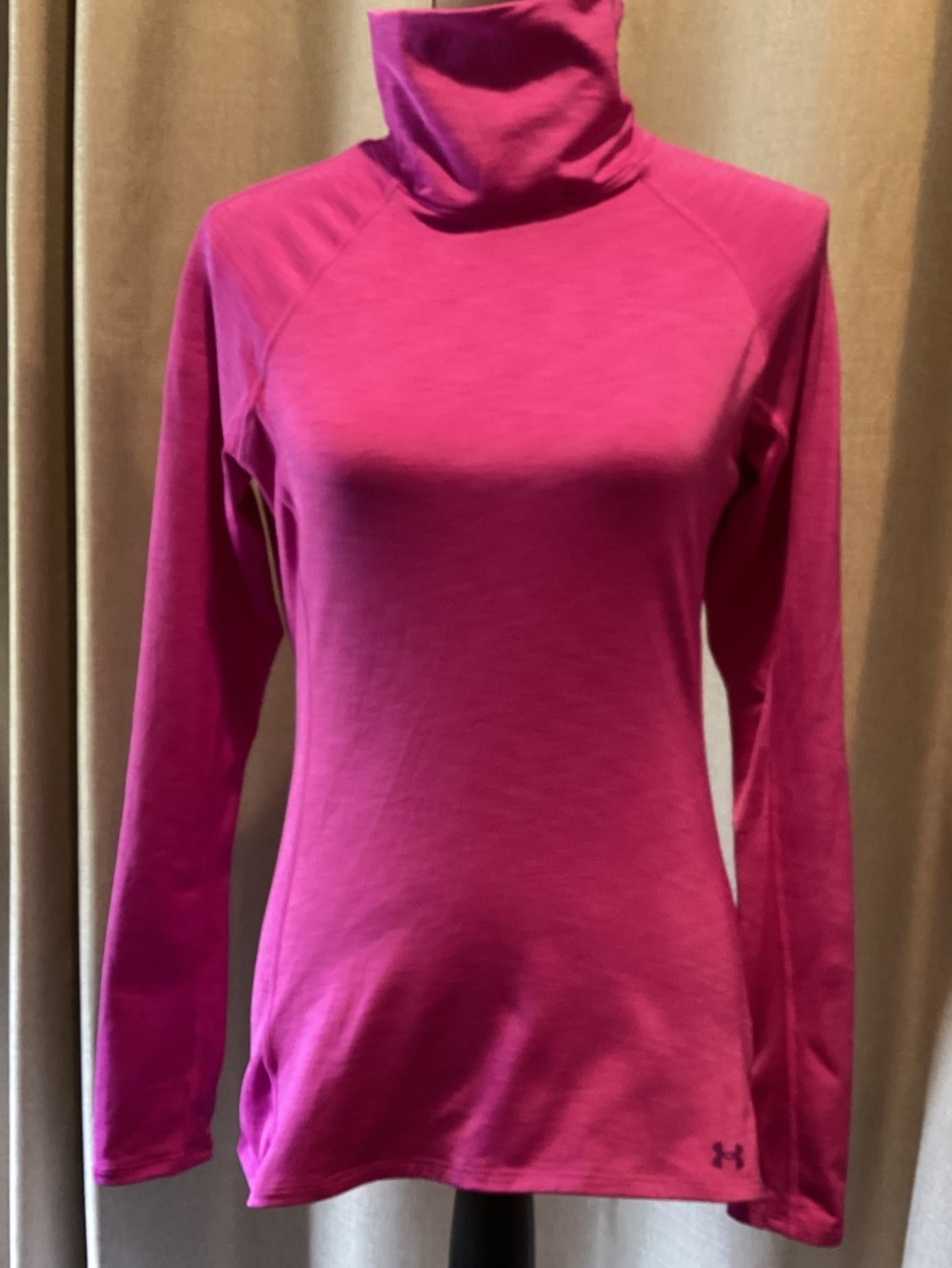 Under Armourbright pink long sleeve  cold gear top, size large.